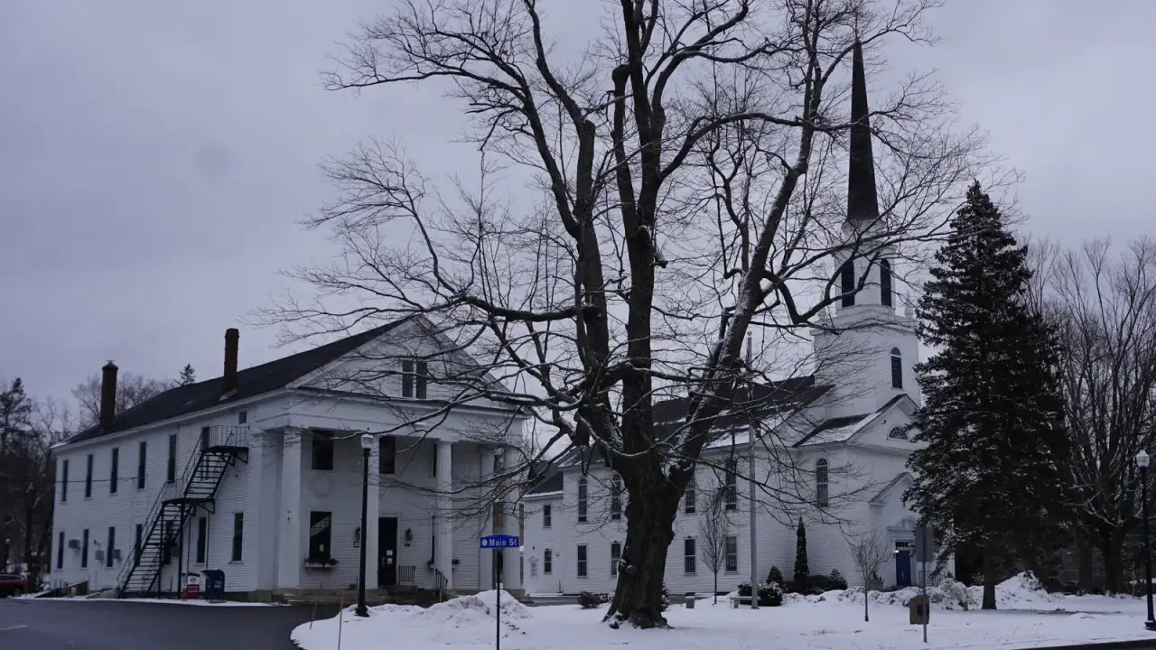 White church and town hall along Main Street in winter, Holden, Massachusetts
