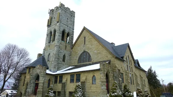 First Congregational Church, a Romanesque stone church with a crenellated tower, Leicester, Massachusetts