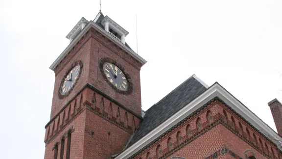Oxford Town Hall, a Romanesque brick memorial building with a clock tower, Oxford, Massachusetts